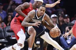 开云体育中国官网-关于猛龙被热火横扫，东契奇砍下三双的信息